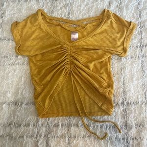 NO BOUNDARIES! mustard yellow drawstring short sleeve ruched crop top